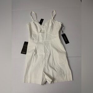 bebe peek-a-boo linen blend romper size 6 inseam 3”
